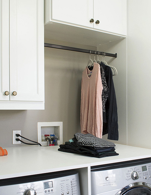 Drying Rod Above Washer and Dryer