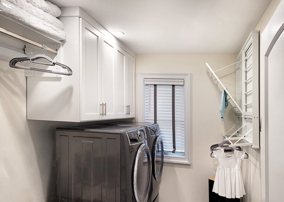 White Shaker Laundry Room Cabinets with Satin Nickel Hardware