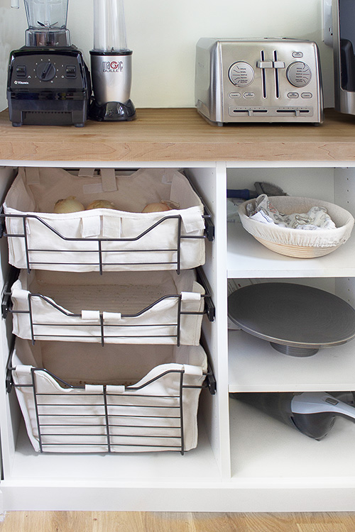 Sliding Baskets and Pantry with Butcher Block Countertop